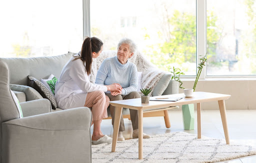 Resident and carer chatting